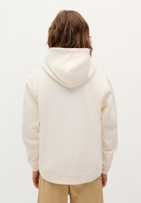 Crème kleurige hoodie met een trekkoordkap, ribgebreide manchetten en een losse pasvorm, gemaakt van zacht textiel. Geen zichtbare graphics.