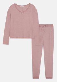Ribbad stickad lounge-set i mjuk rosa, med en V-ringad långärmad topp och byxor med dragsko, sidofickor och ribbade manschetter.