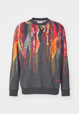 Gray sweatshirt with abstract red, yellow, and black pattern. Ribbed neck and cuffs, featuring a small embroidered logo at the bottom.