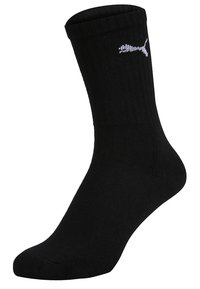 Schwarze Crew-Socken aus Baumwollmischung, mit gerippter Textur und kleinem weißen Puma-Logo an der Seite. Glatte Oberfläche, knöchellanges Design.