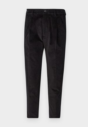 Black corduroy trousers with a textured finish, featuring a straight leg, pleated front, and elastic waistband for comfort.