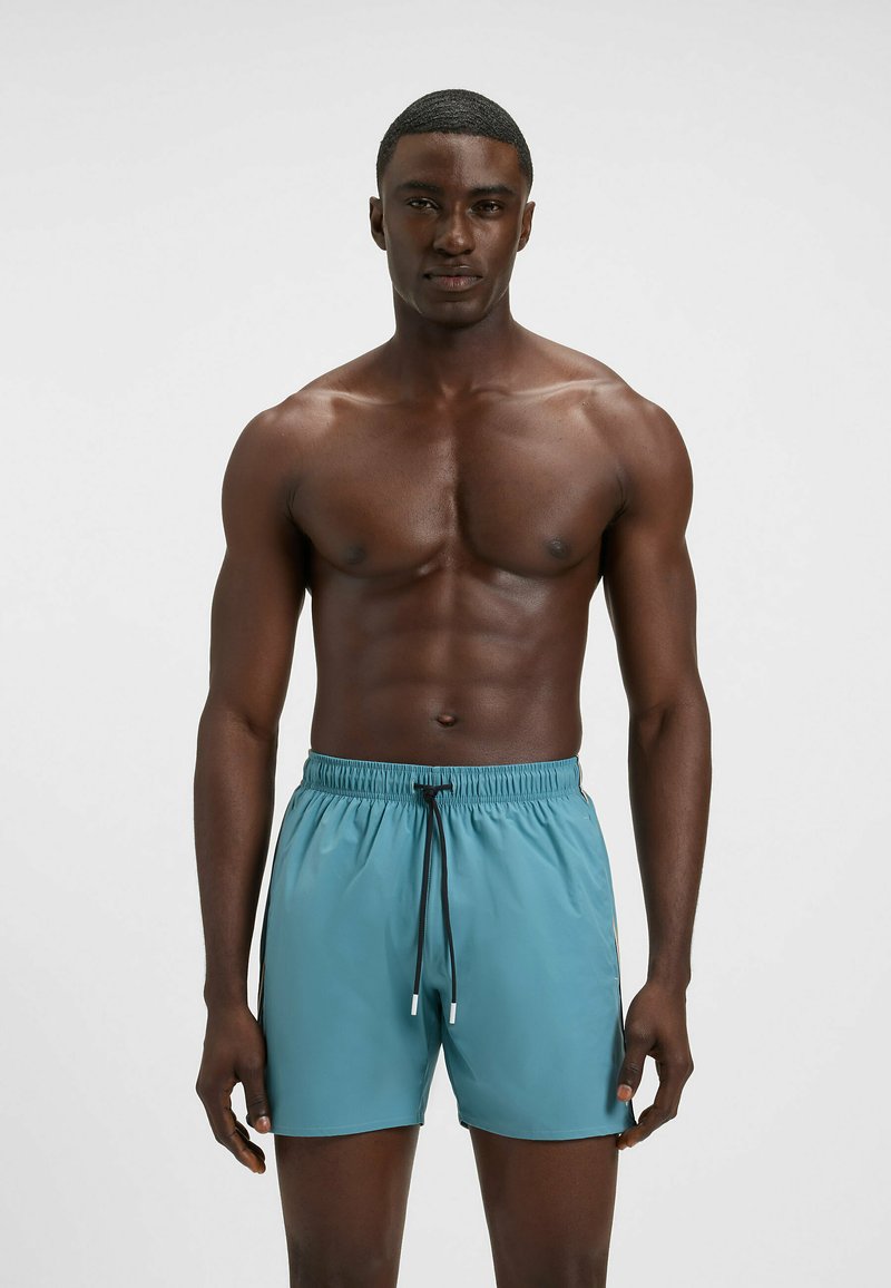 BOSS ICONIC - Swimming shorts - light blue three