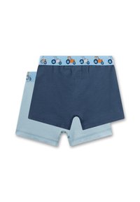 Two pairs of boys' boxer briefs, one navy blue with a tractor print waistband, one light blue, both laid flat on white background.