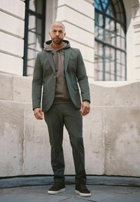 Next MOTIONFLEX - Pantaloni de costum - pine green