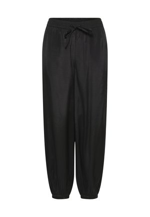 Pantalon ample noir avec taille et chevilles élastiques, équipé d'un cordon de serrage à l'avant pour un ajustement personnalisé.