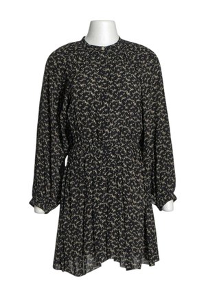 Schwarzes Langarmkleid mit weißem abstraktem Muster, rundem Ausschnitt, geraffter Taille und leicht ausgestelltem Rock auf einer weißen Schaufensterpuppe.