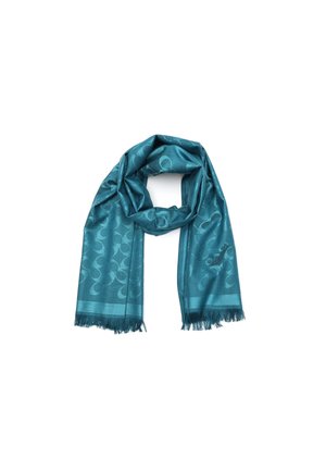 Teal scarf with subtle circular pattern and fringed edges, loosely folded to form a loop on a white background.