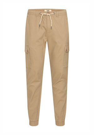 Beige vászon cargo nadrág, rugalmas derékkal és állítható húzózsinórral, oldalsó zsebekkel és szűkített bokákkal.