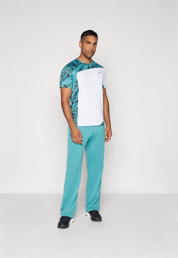 TRAVEN TRACK PANTS - Tracksuit bottoms - teal2