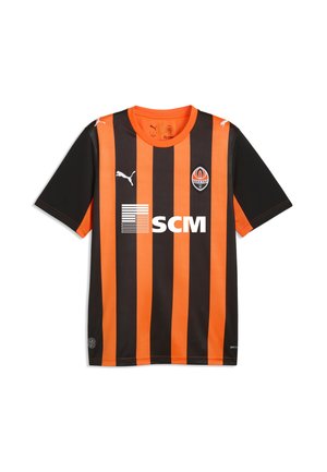 Sort og orange opretstående stribet fodboldtrøje med Puma-logo, Shakhtar Donetsk-klubbens badge og SCM-sponsorlogo på fronten.
