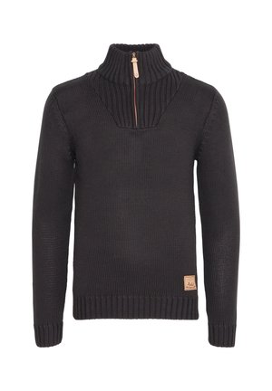 Black knitted sweater with long sleeves, a ribbed high collar with a front zipper, and a small tan logo patch near the hem.