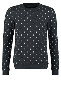 Sudadera negra con un patrón repetido de palmeras blancas, gafas de sol, triángulos y lunas crecientes. Mezcla de algodón con puños acanalados.