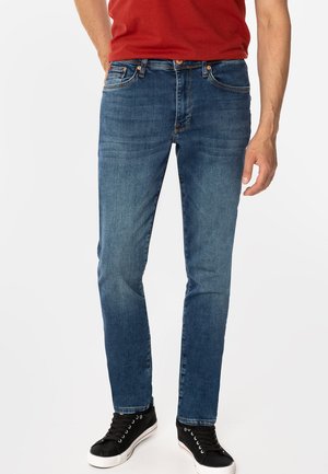 - Jeansy Slim Fit