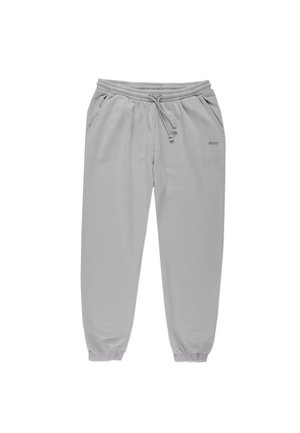 Jasnoszare spodnie dresowe wykonane z miękkiego materiału. Posiadają elastyczny pas ze sznurkiem, ściągacze przy kostkach oraz boczne kieszenie. Subtelne logo z przodu.