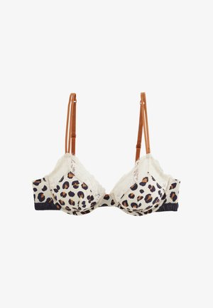 Soutien-gorge à imprimé léopard avec des bordures en dentelle crème, des bretelles réglables brunes et une bande élastique bleue foncée. Tissu doux avec une finition texturée.