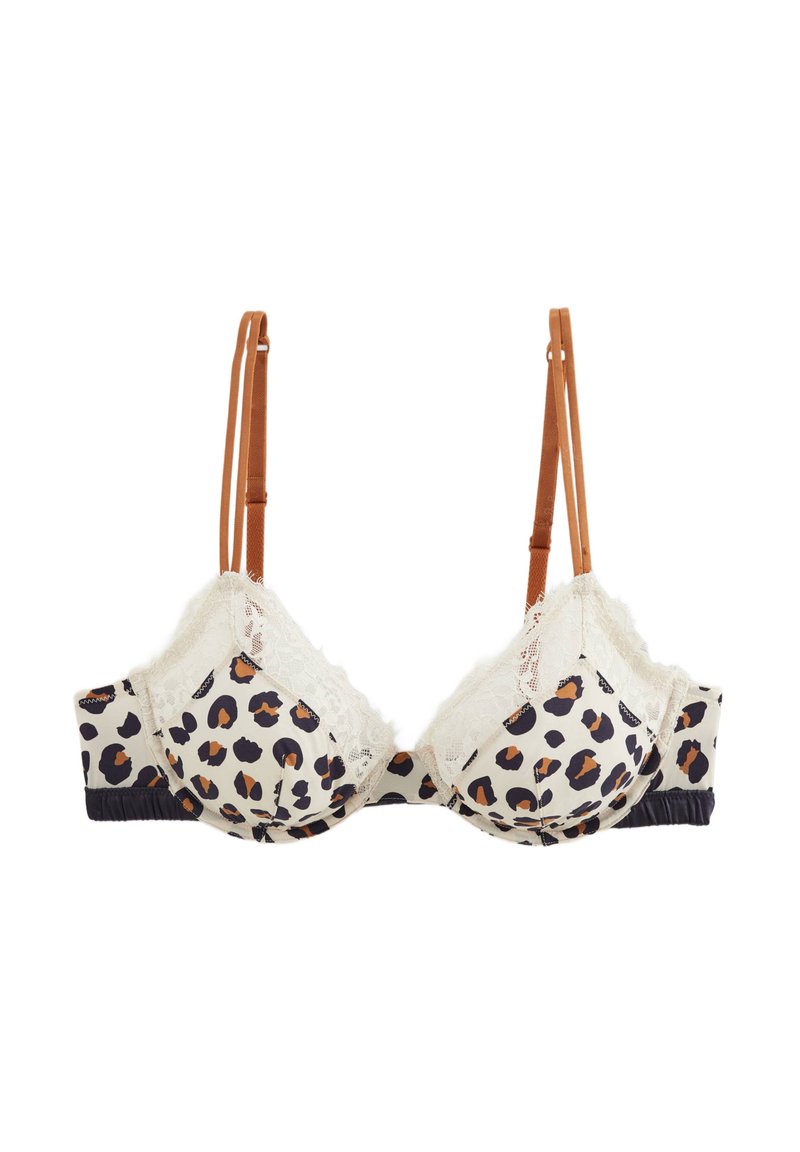 Soutien-gorge à imprimé léopard avec des bordures en dentelle crème, des bretelles réglables brunes et une bande élastique bleue foncée. Tissu doux avec une finition texturée.