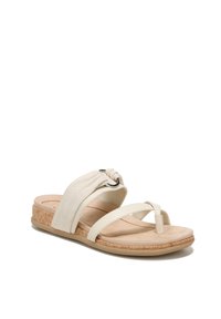Cream-colored slide sandal with knotted fabric strap, cork sole, and rubber outsole. Features a flat design and cross-strap detail.