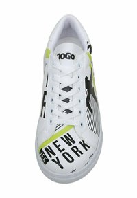 White sneaker with black and yellow graphic design, featuring text "NEW YORK," flat laces, and a smooth synthetic leather upper.
