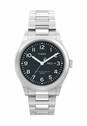 Stainless steel watch with a silver bracelet, black dial, white hour markers, and date display. Features luminous hands and water-resistant design.