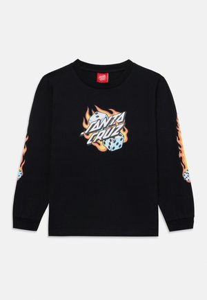 T-shirt noir à manches longues en coton, arborant le logo "SANTA CRUZ" et un graphisme de dés avec des flammes sur le devant et un design similaire sur les manches.