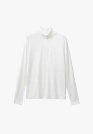 Camisa de cuello alto blanca de manga larga, confeccionada con una tela suave y un corte relajado, exhibida sobre un fondo blanco.