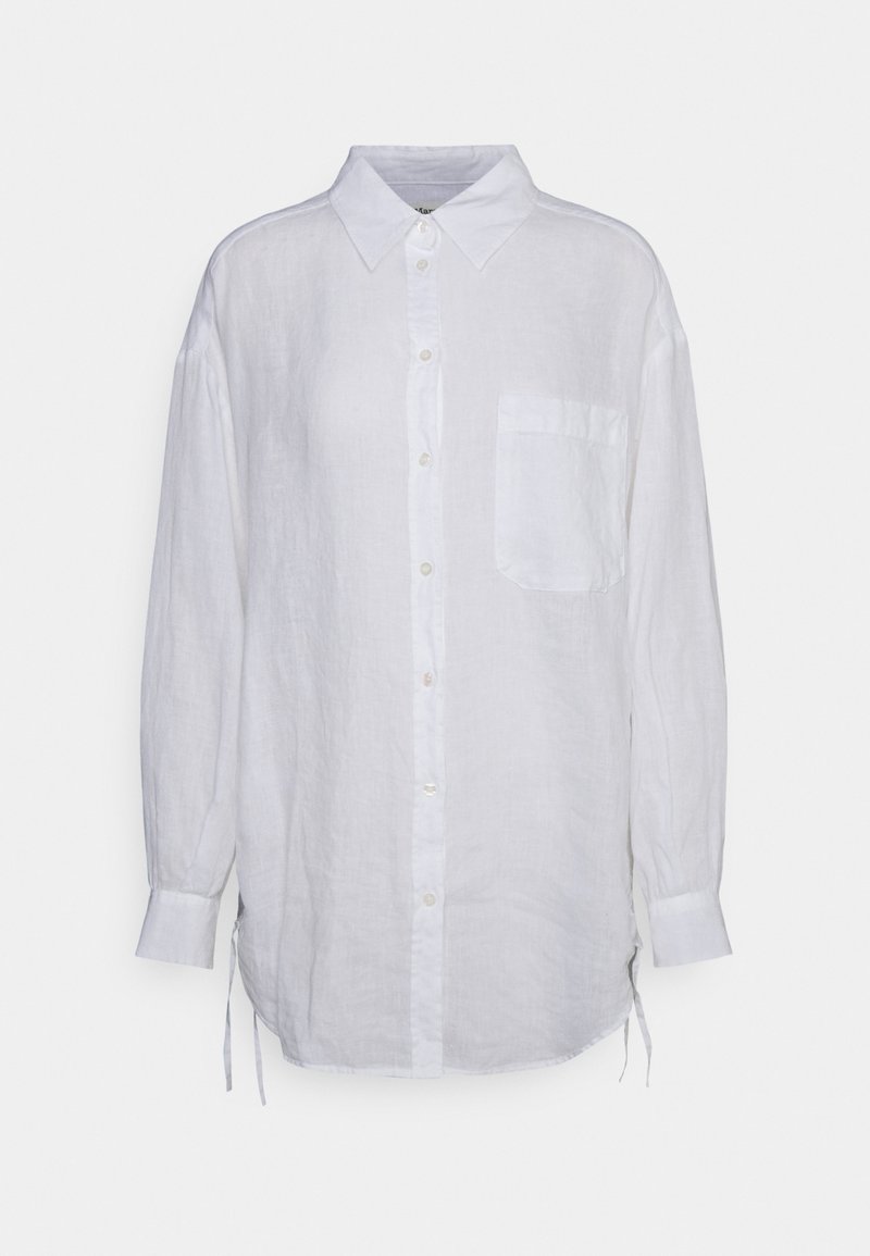 Chemise blanche à manches longues avec boutonnière, col et poche poitrine, en tissu léger avec ourlet légèrement arrondi et liens latéraux.