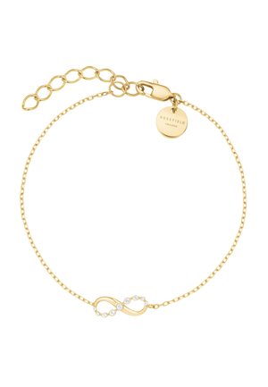 Fijn gouden armband met een infinity-symbool, versierd met kleine witte steentjes en een ronde hanger met de gravure "ROSEFIELD".