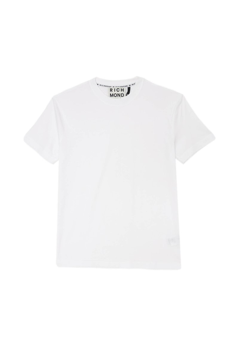 T-shirt bianca in cotone, con scollo rotondo, maniche corte e una piccola etichetta conlogo sul lato sinistro in basso.