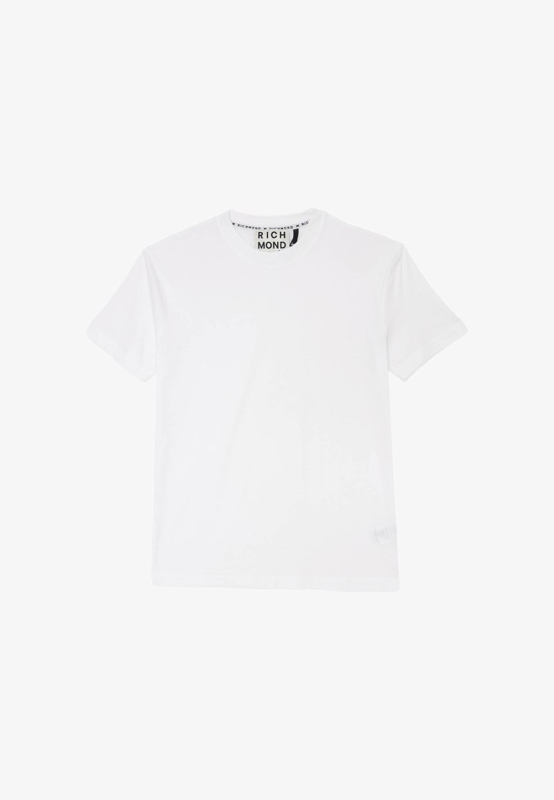 T-shirt bianca in cotone, con scollo rotondo, maniche corte e una piccola etichetta conlogo sul lato sinistro in basso.