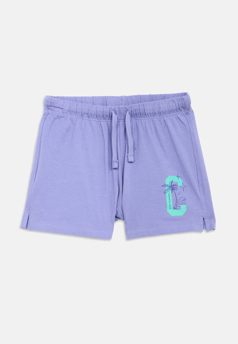 Shorts à cordon de serrage de couleur violet clair avec poches et un graphisme turquoise de la lettre « C » incluant un palmier et une vague sur la jambe droite.
