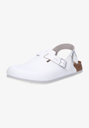 White clogs with a textured upper, adjustable silver buckles, and a cork footbed. Features a rounded toe and closed heel design.