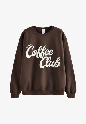 Donkerbruine sweater met ronde hals, lange mouwen en witte tekst 'The Coffee Club' op de voorkant.