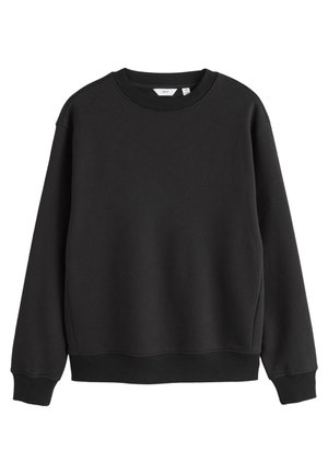 Sweat-shirt noir à col rond, manches longues, poignets et ourlet côtelés, présenté sur fond blanc.