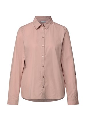 Chemise boutonnée à manches longues de couleur rose pâle avec col, comportant sept boutons sur le devant et un ourlet légèrement arrondi.