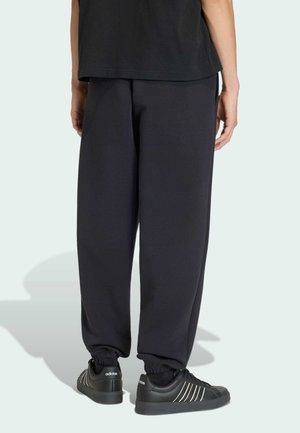 adidas Sportswear, SOFT LUX PANTS - Verryttelyhousut - black