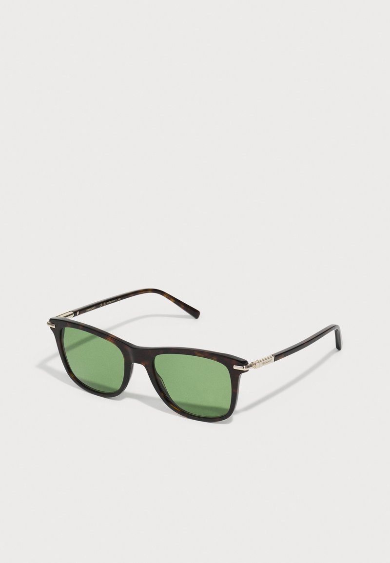 Tortoiseshell sunglasses with green lenses, rectangular shape, metal accents on the temples, glossy finish, and thin, rounded arms.