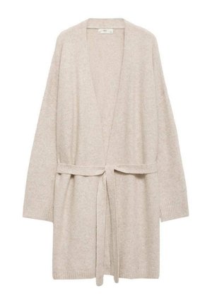 Beige neulecardigan pitkähihaisilla, avonaisella edellä ja vyötäröllä solmittavalla vyöllä. Pehmeä rakenne ja ribbitekniikka hihansuissa.