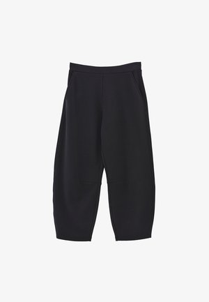 Pantalons de survêtement noirs en tissu doux, présentant un design à jambes larges, deux poches latérales et une taille élastique pour plus de confort.