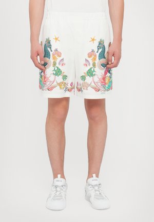 White swim shorts featuring colorful sea-themed embroidery, including seahorses, fish, and shells. Elastic waistband for comfortable fit.