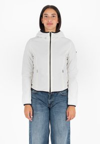 Witte, hoodie-jack met een getailleerd ontwerp, ritssluiting aan de voorkant en twee zijzakken. Heeft zwarte boorden langs de randen. Soepele textuur.