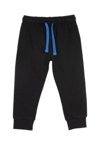 Svarta sweatpants med elastisk midja och blå dragkedjor. Har ribbade mudd vid anklarna. Mjuk bomullsmix.