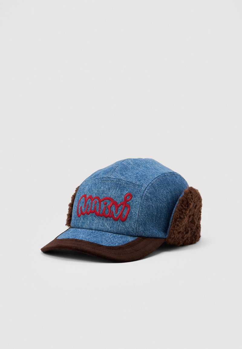 Denim blue cap with brown fuzzy ear flaps and red embroidered stylized text on the front panel, set against a plain background.