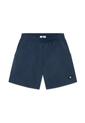 Laivastonsiniset shortsit, jotka on valmistettu kevyestä kankaasta. Niissä on elastinen vyötärö, sivutaskut ja pieni musta logoyksityiskohta.