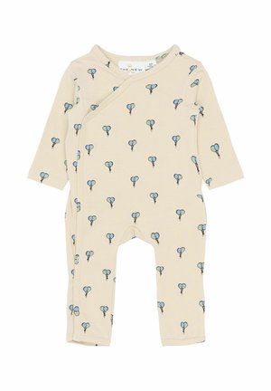 Beżowy romper dla niemowląt z długimi rękawami, ozdobiony nadrukiem niebieskich balonów. Zapięcia na napy po boku ułatwiają ubieranie. Miękki materiał bawełniany.