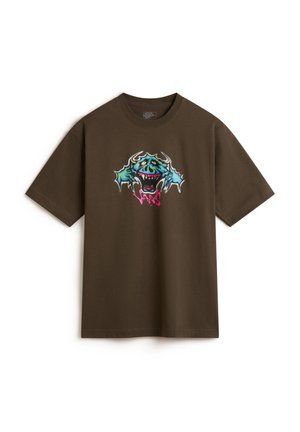 Brown cotton t-shirt featuring a vibrant graphic design with blue and pink accents, depicting a stylized monster face and sharp fins.