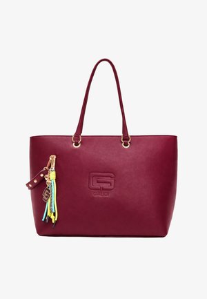 Borsa tote in pelle bordeaux con logo Gaudí in rilievo, doppi manici e portachiavi con nappina colorata attaccato a un lato.