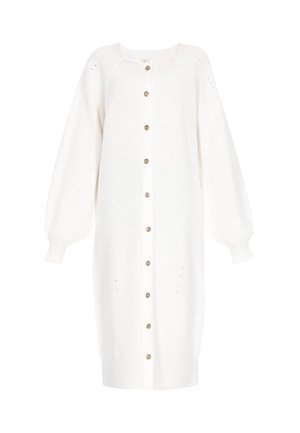 Fehér kötött kardigán hosszú, puffos ujjal, elülső gombokkal és kis dekoratív lyukakkal az oldalán. Puha textúra.