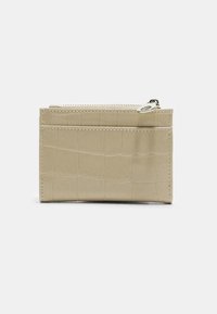 Crocodile-textured beige cardholder with a zip closure, featuring front and back slots for cards and a smooth finish. Compact design.