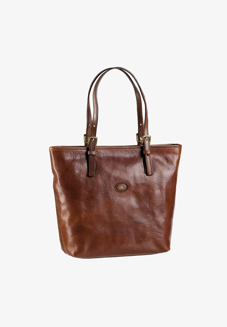 Borsa a spalla in pelle marrone con due manici e una piccola patch ovale con logo sul davanti, mostrata su uno sfondo bianco.