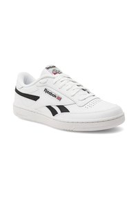 Valge nahast jooksujalanõud mustade aktsentidega, ümmargune varvas, perforeeritud detailid ja tekstureeritud kummist tald. Küljel Reeboki logo.